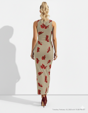 A sleeveless beige bodycon maxi dress embellished with scattered red floral prints for a bold yet elegant, nature-inspired look.