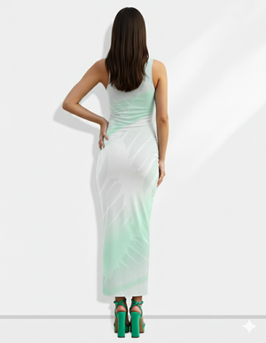 A sleeveless white bodycon maxi dress featuring soft mint-green abstract leaf washes for a serene, airy, and modern look.