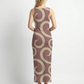 A sleeveless, body-hugging maxi dress in muted mauve with large abstract swirl patterns in beige, offering a sleek and modern look.