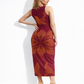 A sleeveless burgundy bodycon maxi dress featuring bold golden lotus-inspired motifs for a rich, elegant, and statement-making look.
