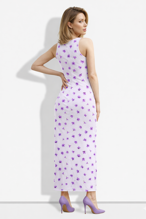 A sleeveless light lavender bodycon maxi dress adorned with scattered small purple floral prints for a delicate, fresh, and feminine look.