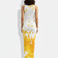 A sleek white sleeveless bodycon midi dress accented with a bold yellow abstract splash print for a modern, artistic look.