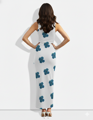 A sleek white sleeveless bodycon maxi dress featuring scattered teal-blue floral motifs for a clean, modern, and elegant look.