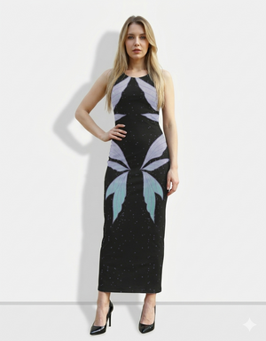 A sleeveless black bodycon maxi dress featuring a celestial-inspired design with starry speckles and stylized butterfly-like wing motifs for a dreamy, artistic look.