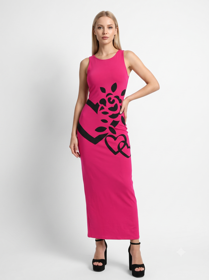 A stunning sleeveless bodycon maxi dress featuring a vibrant fuchsia base with an elegant black floral and heart motif, creating a bold, romantic, and contemporary look.