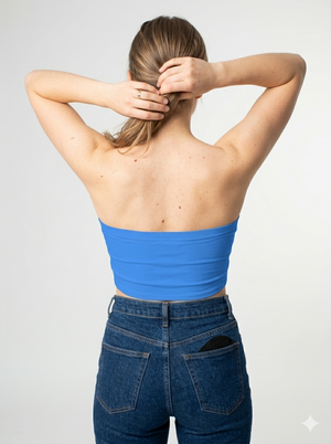 A minimalist strapless tube top in a vibrant solid blue with a smooth, clean, and modern finish.