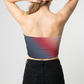 A strapless tube top with a smooth diagonal gradient blending deep navy, rich red, and soft beige tones for a bold, modern look.