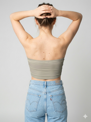 A minimalist strapless tube top in a smooth solid taupe shade with a clean, understated design.