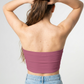 A mauve strapless tube top featuring a delicate light line-art floral arrangement forming a soft heart-like shape across the front.