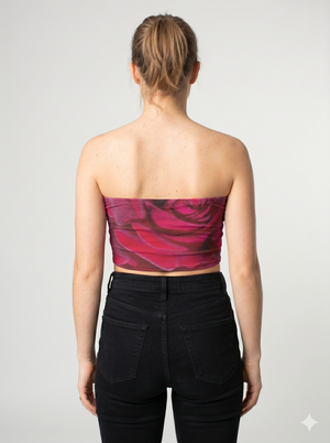 A strapless tube top featuring a bold, full-coverage red rose print with rich, vibrant tones for a dramatic floral look.