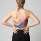 A strapless tube top featuring a dreamy abstract swirl of soft pastel gradients with subtle sparkly accents for a vibrant, artistic look.