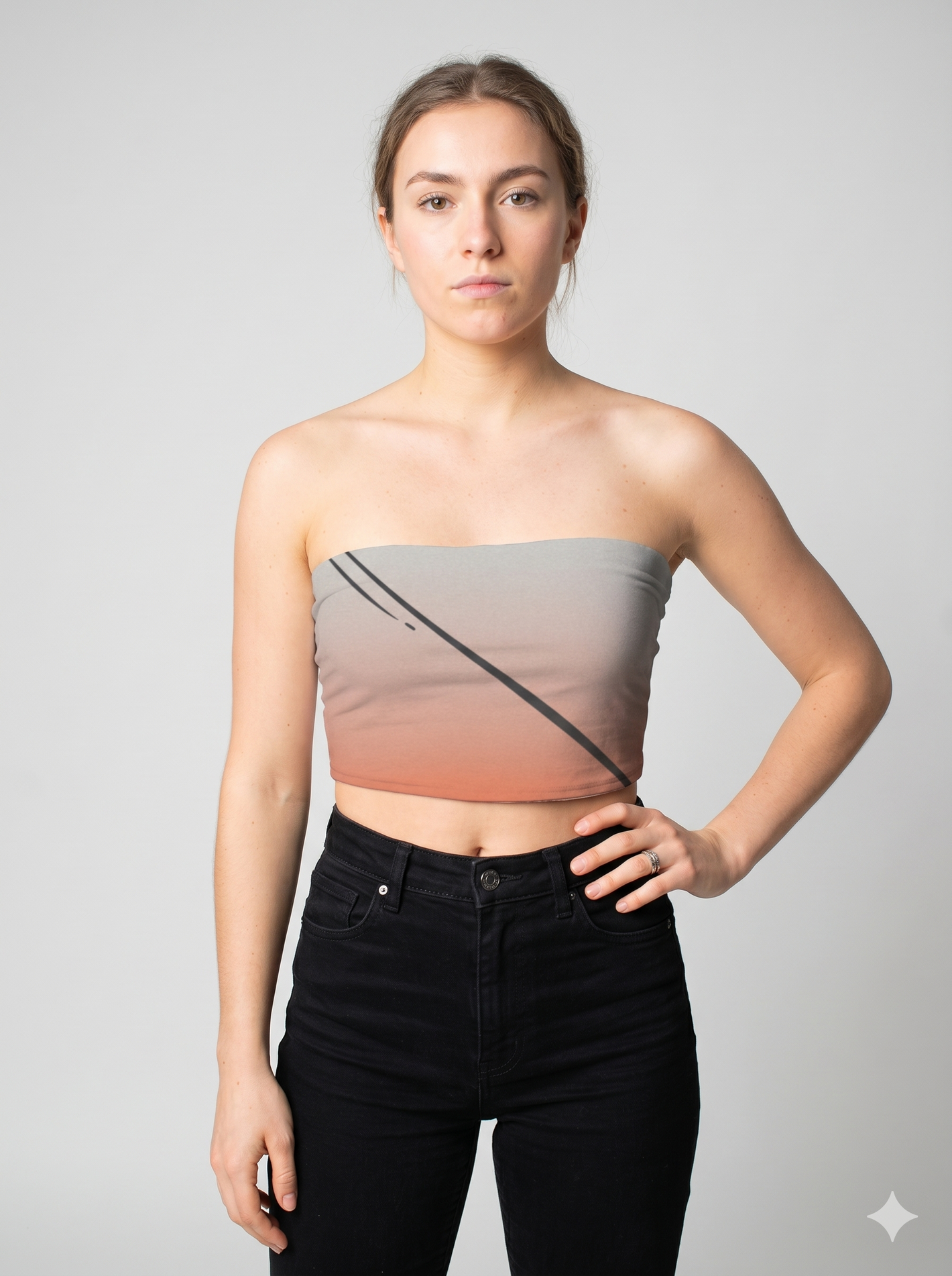 A strapless tube top featuring a soft gray-to-blush gradient with bold diagonal black lines for a modern, edgy look.