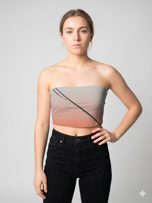 A strapless tube top featuring a soft gray-to-blush gradient with bold diagonal black lines for a modern, edgy look.