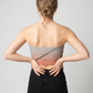 A strapless tube top featuring a soft gray-to-blush gradient with bold diagonal black lines for a modern, edgy look.