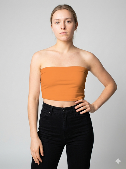 A minimalist strapless tube top in a vibrant solid orange with a smooth, clean, and energetic finish.