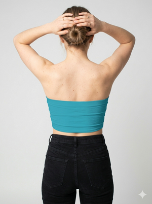 A minimalist strapless tube top in a vibrant teal blue with a smooth, clean, and modern finish.