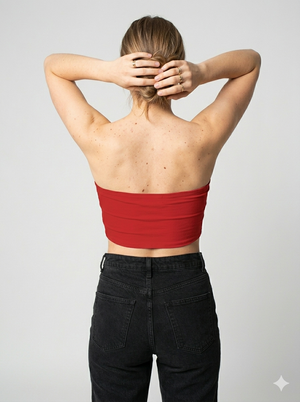 A minimalist strapless tube top in a bold solid red with a smooth, clean, and striking finish.