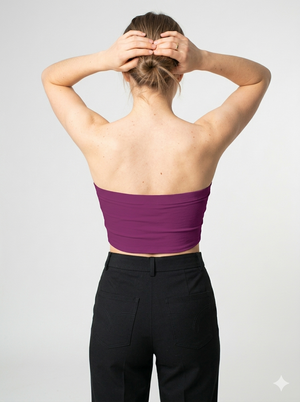 A minimalist strapless tube top in a rich magenta-purple shade with a smooth, clean, and bold finish.